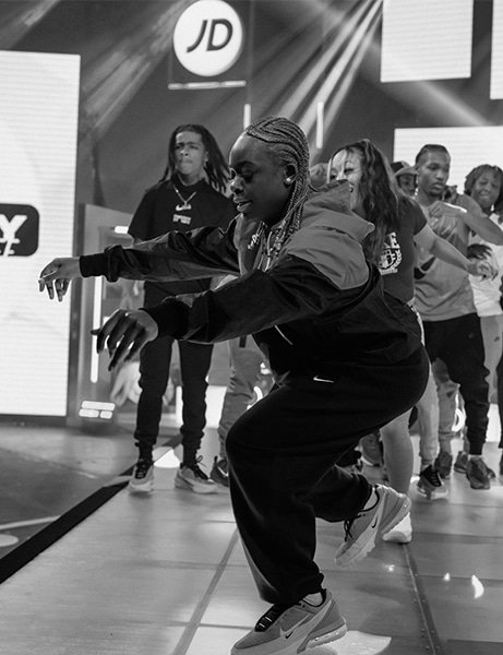 JD Sports conference with people dancing